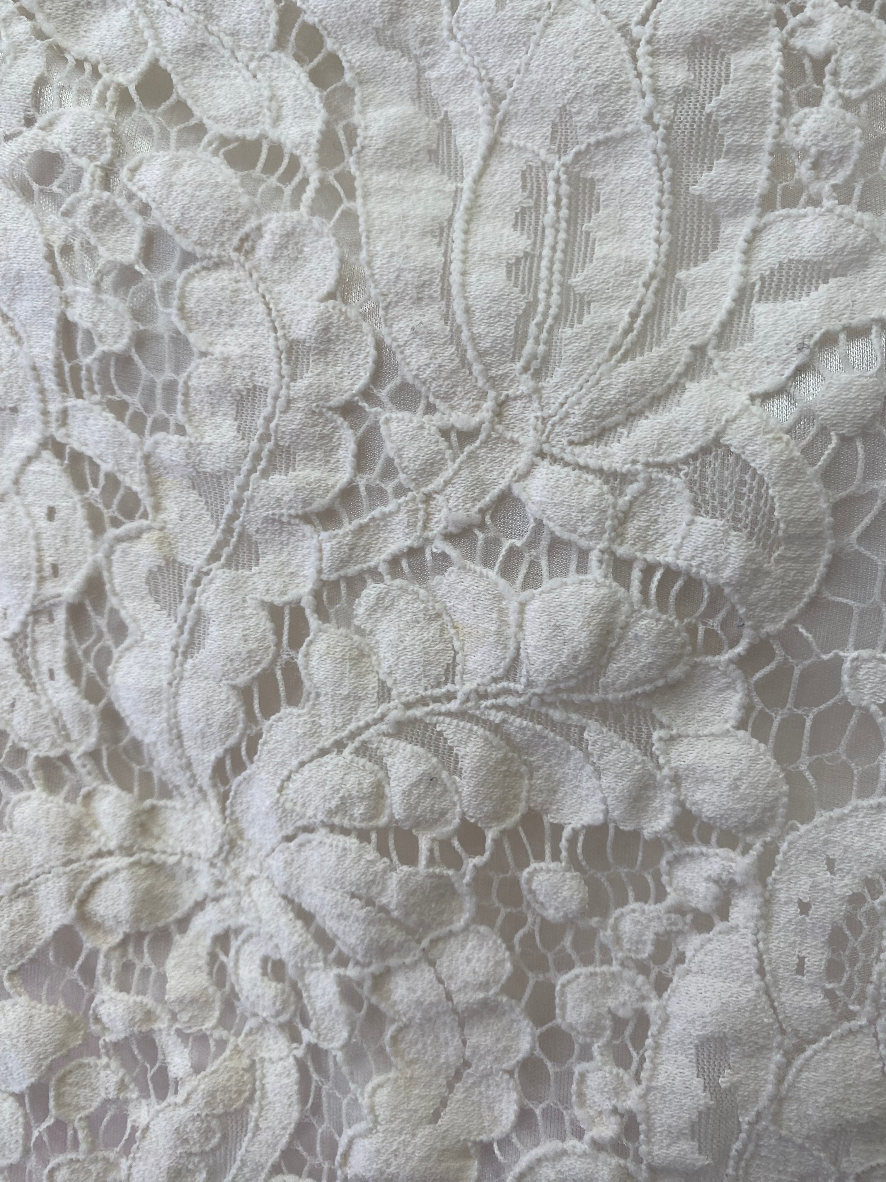 White lace sleeveless top