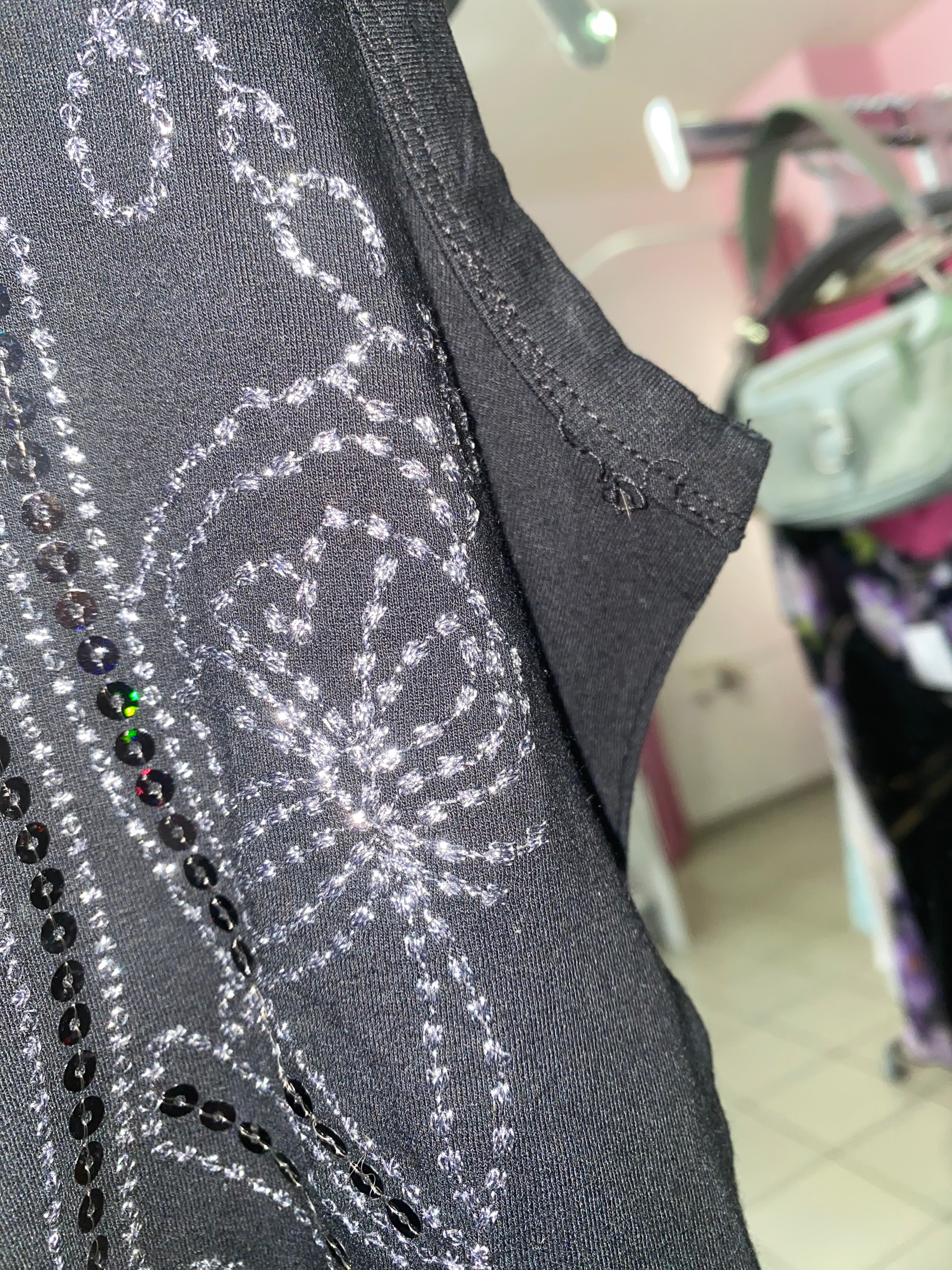 Black tank with sequin pattern