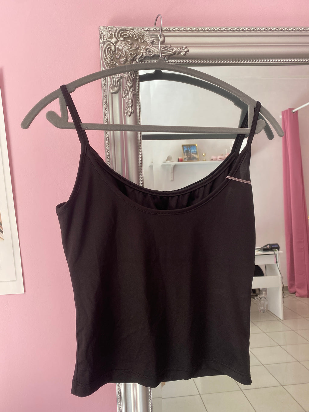 Black cami top with a sparkly heart