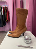 Brown leather boots with stitching