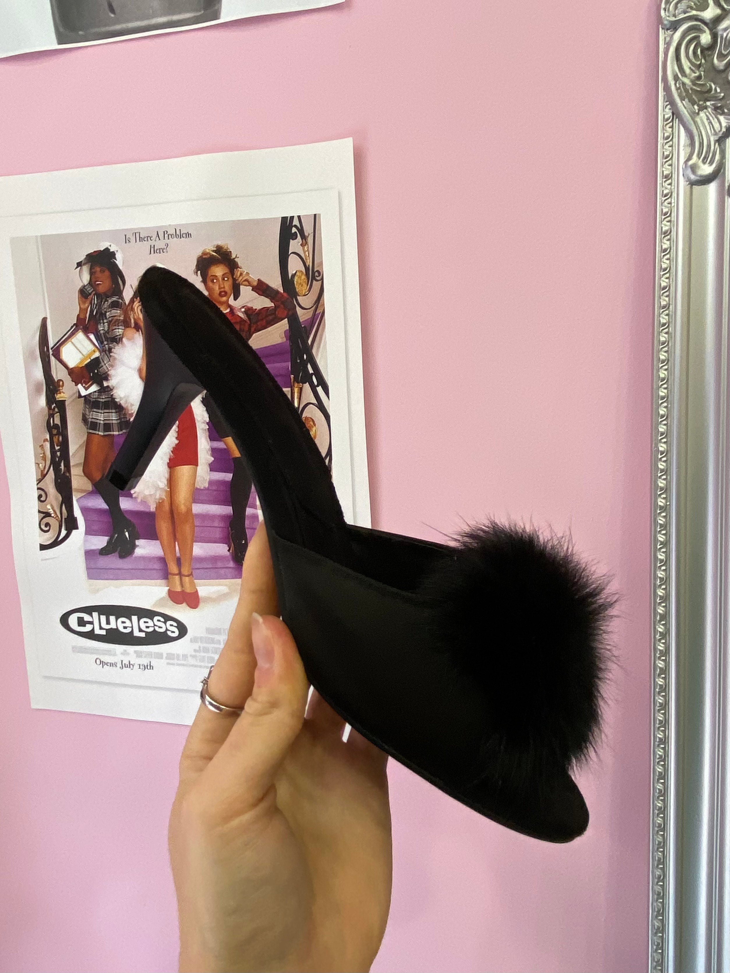 Black shoes with a fluff